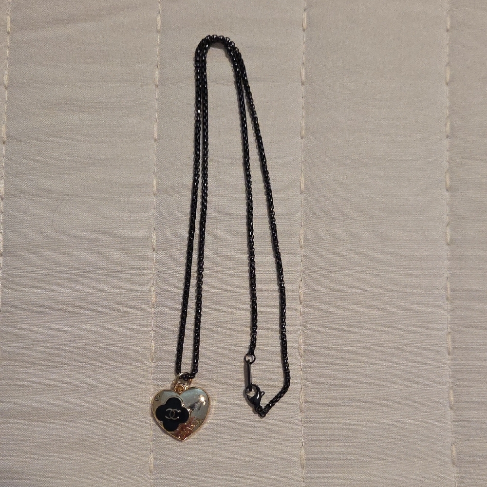 CHANEL Black and Gold Heart Necklace
